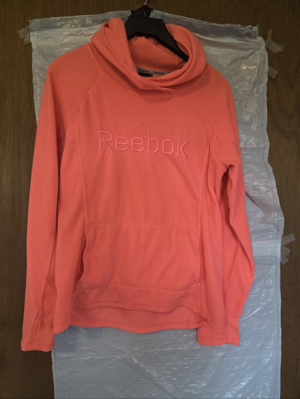 Reebok Women’s Coral Cowl-Neck Pullover Sweater. Has tiny spot on the chest.